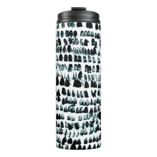 Black paint stains with spots, blots and grains on thermal tumbler