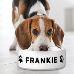 Black Paw Print Monogram Pet Name Bowl<br><div class="desc">A bold black paw print pet bowl featuring the pet's name in striking black typography with paw accents on a white ceramic bowl. This classic monogram design is a timeless personalized gift for dogs and cats that fits any decor. The name is fully customizable.</div>