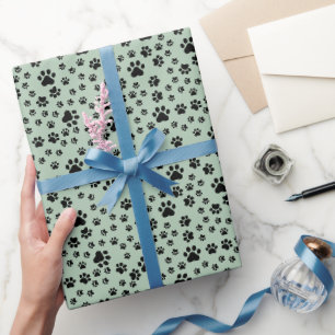 Black Paw Prints on Light Green Wrapping Paper