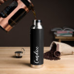 Black Personalized Wedding Bridesmaid Water Bottle<br><div class="desc">Gift your wedding bridesmaid or maid of honour with this trendy,  vacuum Insulated water bottle that features her name in white,  stylized script on a solid black background. Personalize bottle by editing and replacing name with your own as desired. Select your water bottle style.</div>