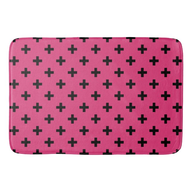 Black polka crosses on fuchsia bath mat (Front)