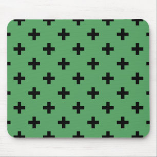 Black polka crosses on green mouse pad
