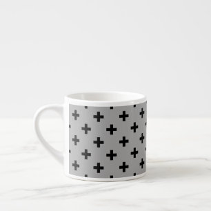 Black polka crosses on grey espresso cup