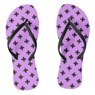 Black polka crosses on lilac flip flops