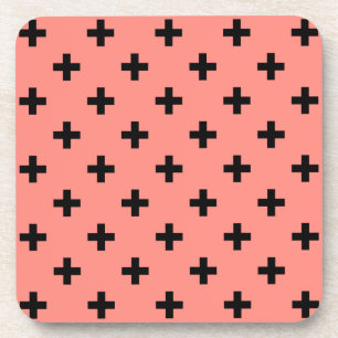 Black polka crosses on peach coaster