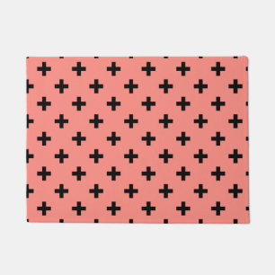 Black polka crosses on peach doormat