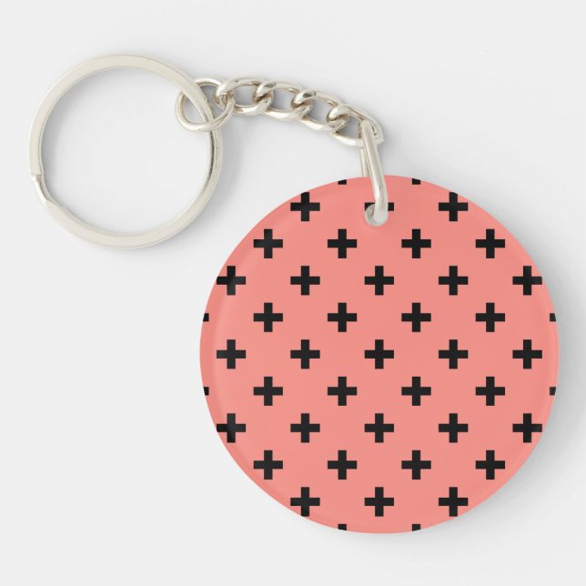 Black polka crosses on peach keychain (Front)