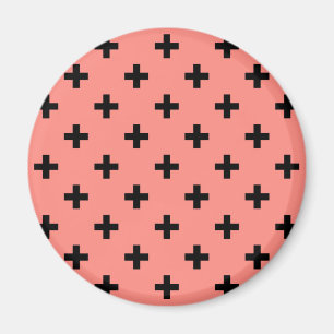 Black polka crosses on peach magnet