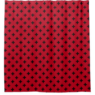 Black polka crosses on red