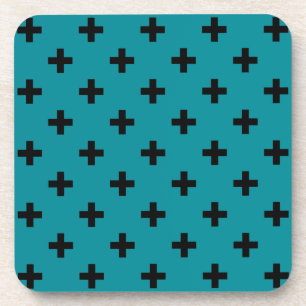 Black polka crosses on teal coaster