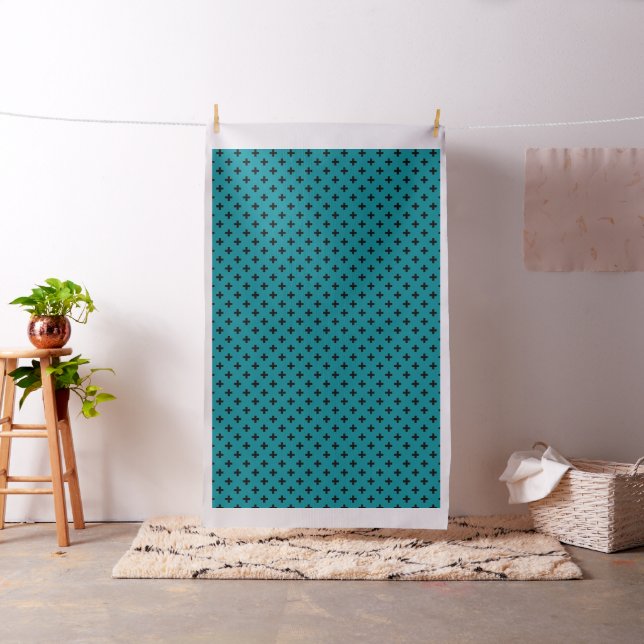 Black polka crosses on teal fabric (In Situ)