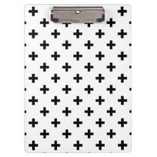Black polka crosses on white clipboard