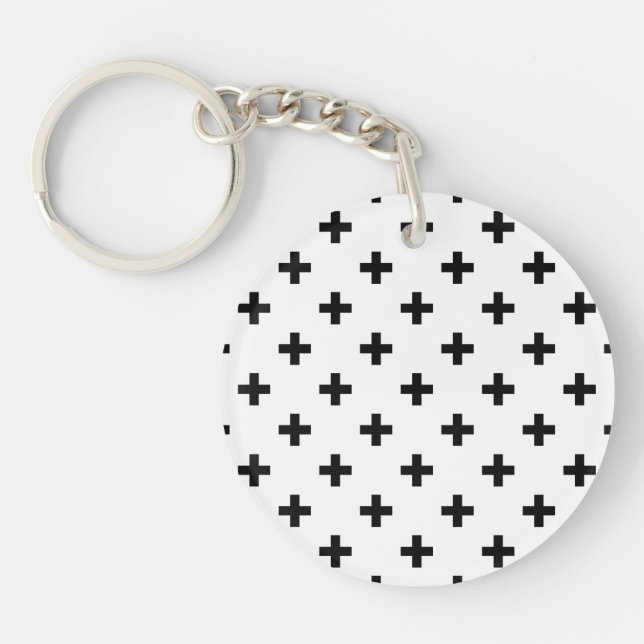 Black polka crosses on white keychain (Front)