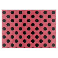 Black polka dots on coral