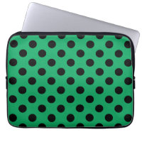 Black polka dots on fresh green