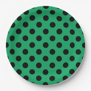 Black polka dots on fresh green paper plate