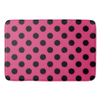 Black polka dots on fuchsia