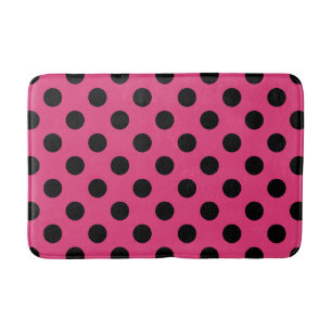 Black polka dots on fuchsia bath mat