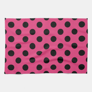 Black polka dots on fuchsia kitchen towel