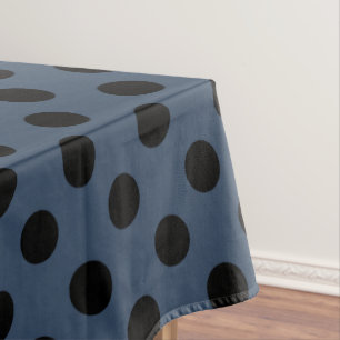 Black polka dots on grey-blue tablecloth