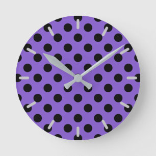 Black polka dots on lavender round clock