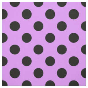 Black polka dots on lilac fabric