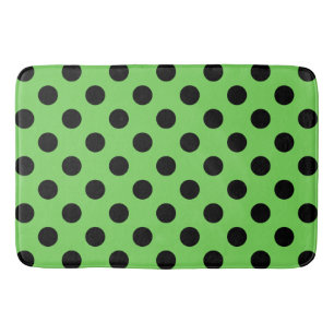 Black polka dots on lime green bath mat