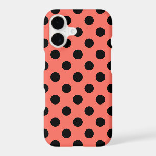 Black polka dots on living coral