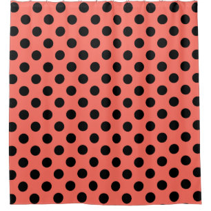 Black polka dots on living coral