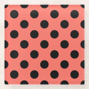 Black polka dots on living coral glass coaster