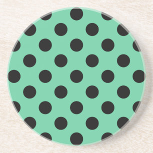 Black polka dots on mint green coaster