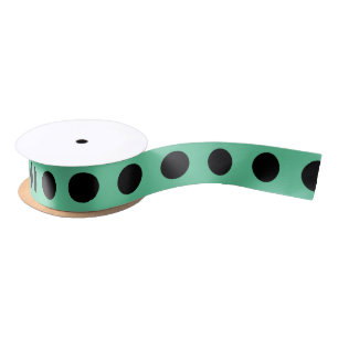 Black polka dots on mint green satin ribbon