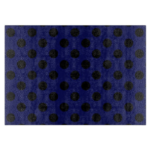 Black polka dots on navy blue cutting board