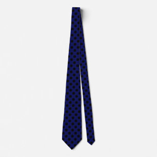 Black polka dots on navy blue tie