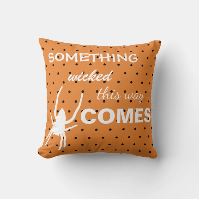 Black polka dots on orange background spider throw pillow (Front)