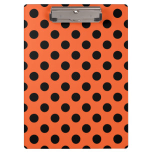 Black polka dots on orange clipboard
