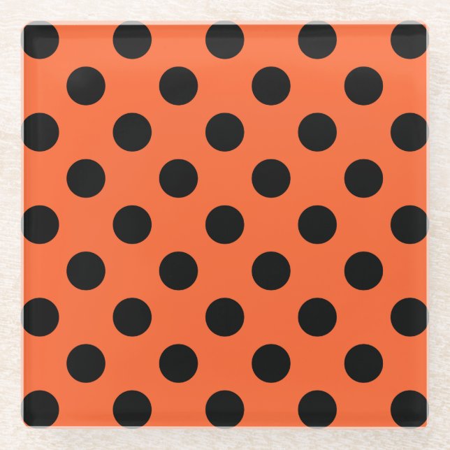 Black polka dots on orange glass coaster (Front)
