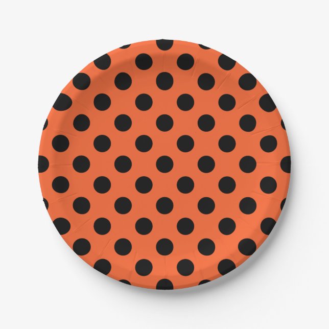Black polka dots on orange paper plate (Front)
