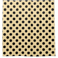 Black polka dots on pale yellow