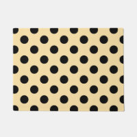 Black polka dots on pale yellow