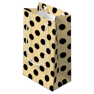 Black polka dots on pale yellow small gift bag