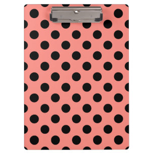 Black polka dots on peach clipboard