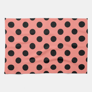 Black polka dots on peach kitchen towel