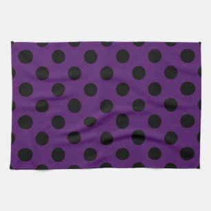 Black polka dots on plum purple kitchen towel