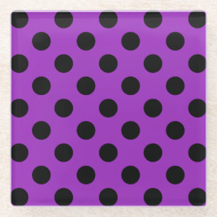 Black polka dots on purple glass coaster