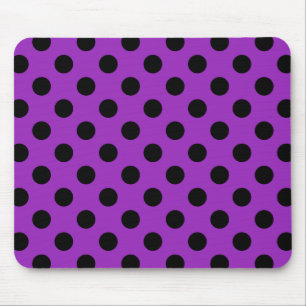 Black polka dots on purple mouse pad