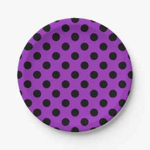 Black polka dots on purple paper plate