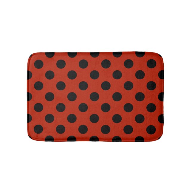 Black polka dots on red bath mat (Front)