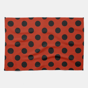 Black polka dots on red kitchen towel