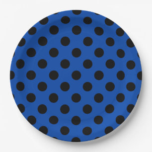 Black polka dots on royal blue paper plate